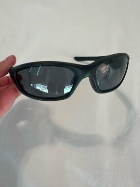 Oakley Black Wrap Sunglasses with Dark Gray Lenses